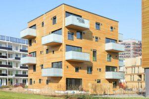 РФ: Минстрой планирует развивать строительство деревянных многоэтажек